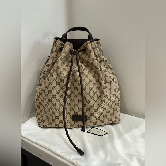 Gucci Handbags - BN Gucci GG Drawstring Backpack